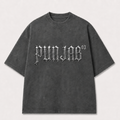 A dark gray mineral-washed t-shirt with 'PUNISAB 03' printed in a stylized silver gothic font across the chest, displayed on a light gray background.