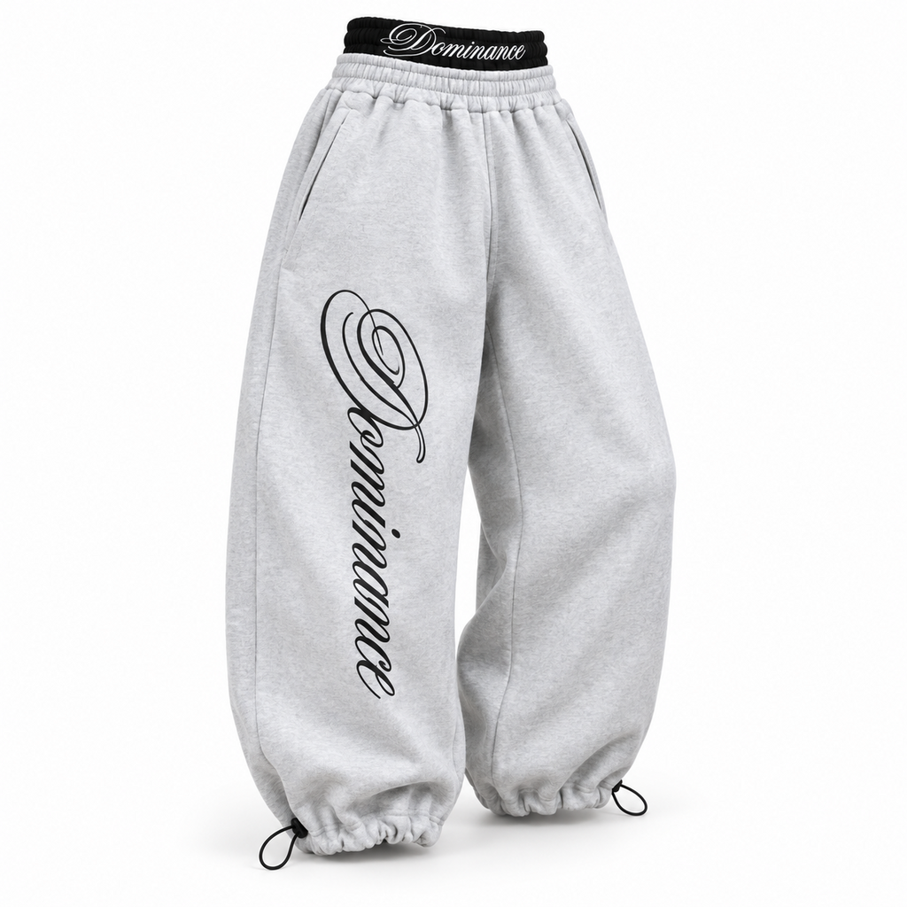 Dominance grey barrel trackpants three quarter view