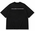 Black oversized T-shirt front with I Challenge the Darkness text