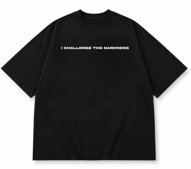 Black oversized T-shirt front with I Challenge the Darkness text