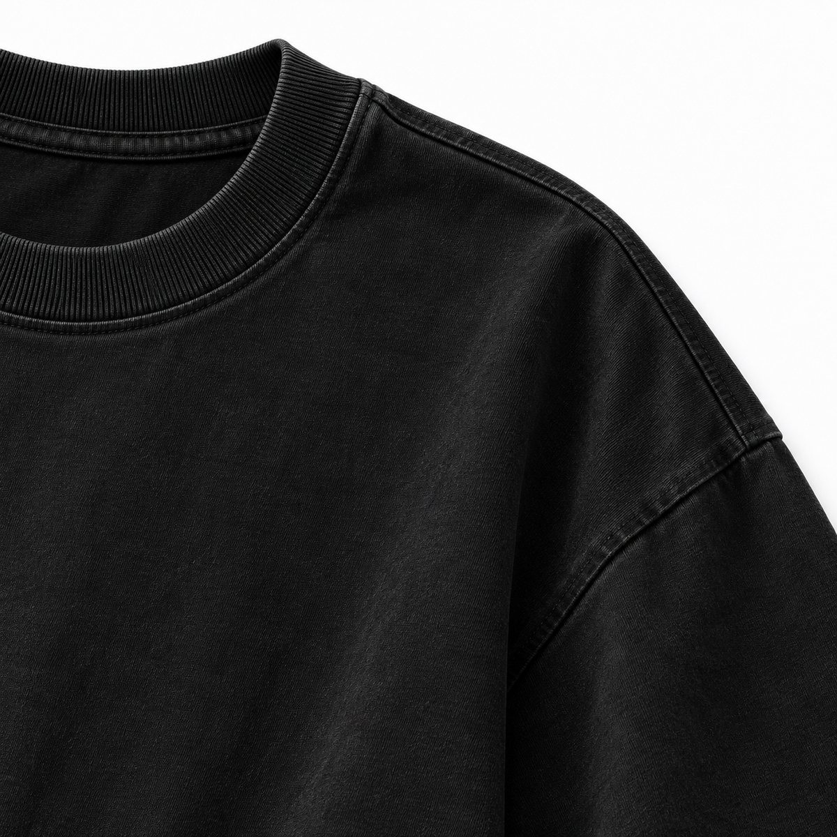 Black oversized statement T-shirt collar and fabric close-up