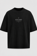 A black short-sleeve crewneck t-shirt with a distressed white graphic on the chest reading 'ONLY GOD CAN SAVE ME' with a cross design, shown against a light gray background.