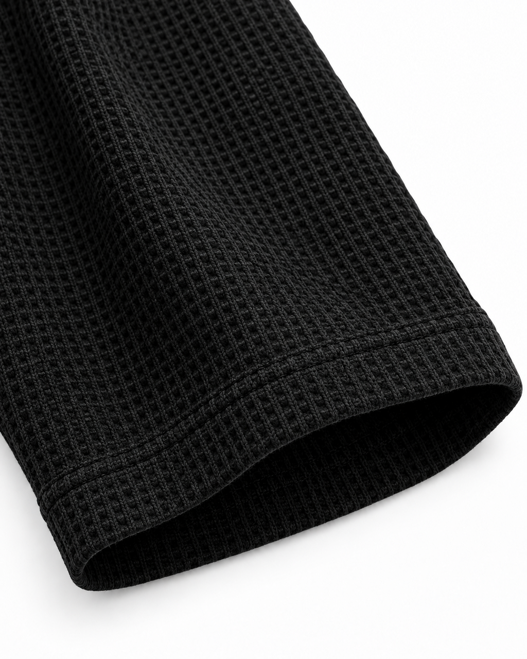 Black waffle knit tee open sleeve cuff detail